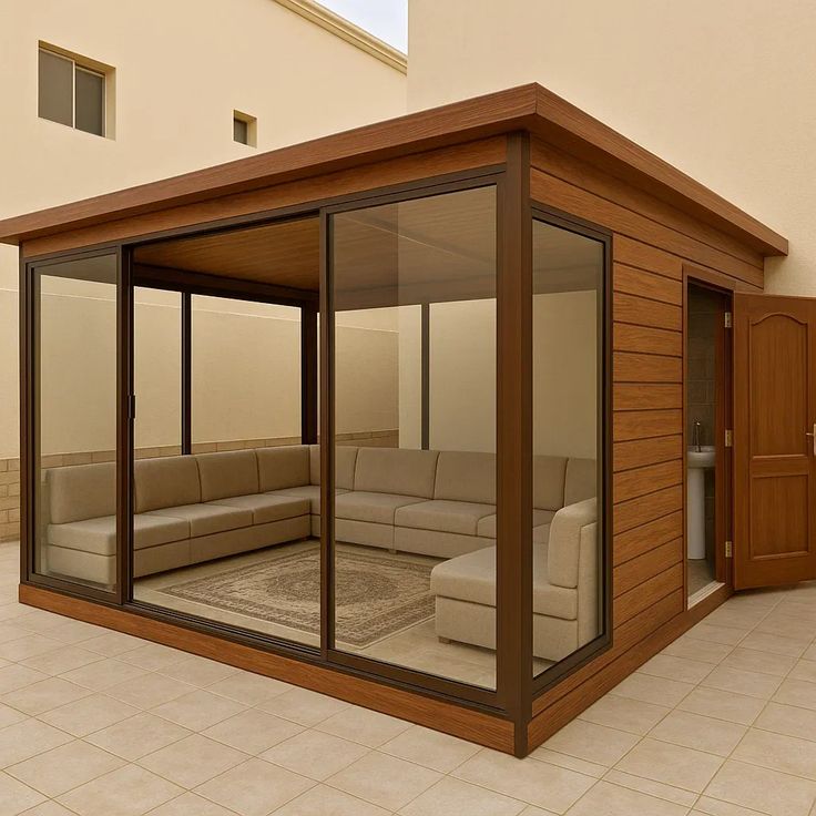 Outdoor glass-walled garden room cabin