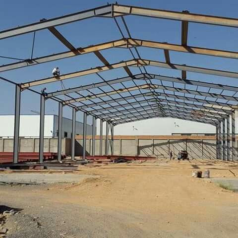 Steel warehouse frame under erection